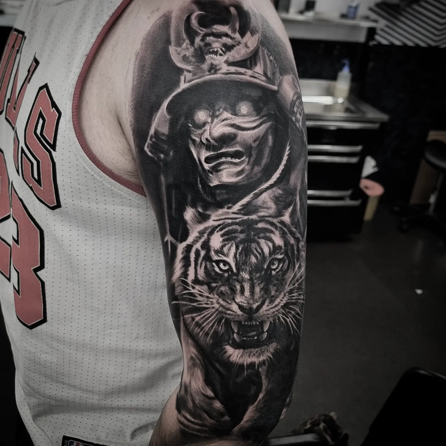 Realistic black and grey wildlife tattoo by Tomek Turlej at Studio XIII Gallery Edinburgh