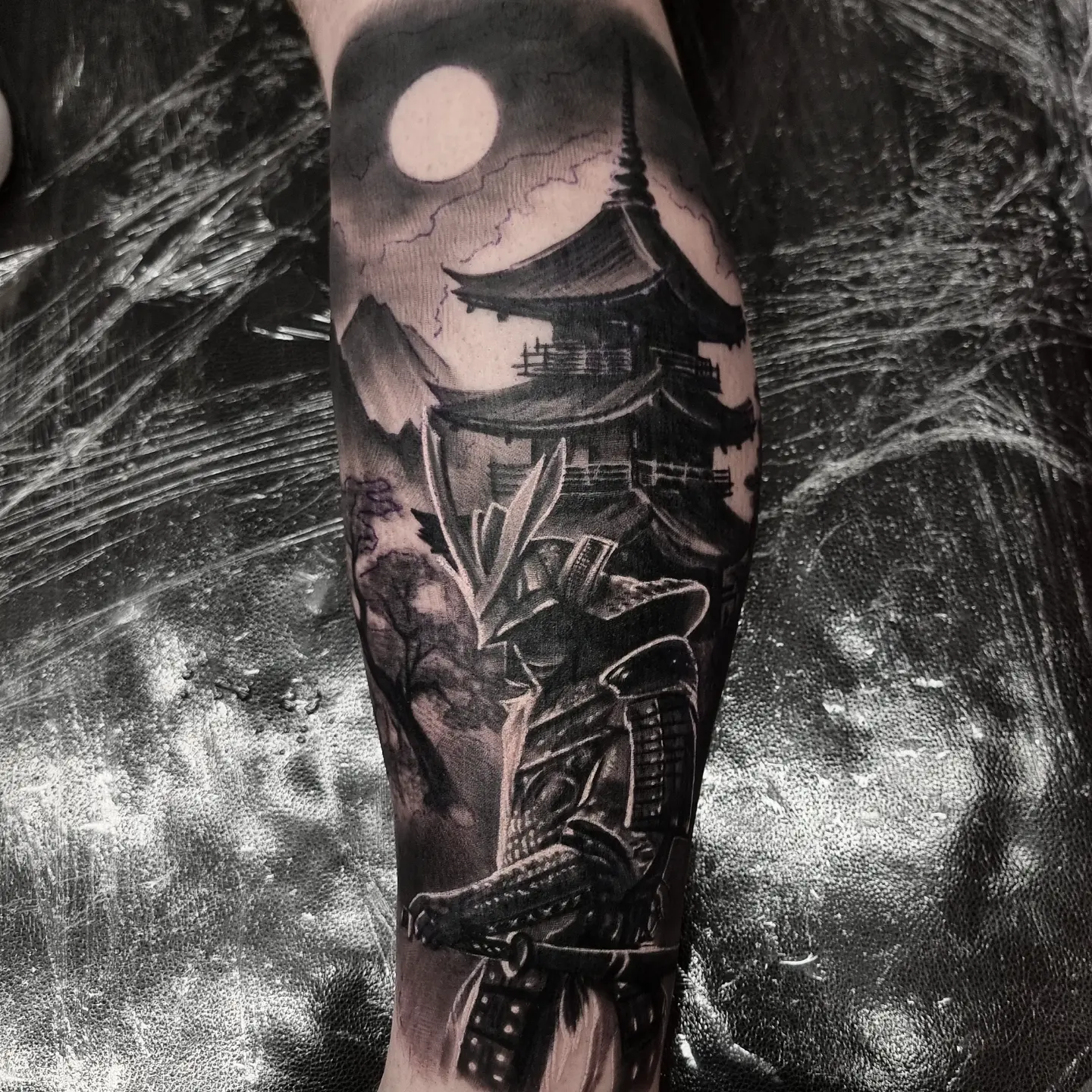 Realistic black and grey wildlife tattoo by Tomek Turlej at Studio XIII Gallery Edinburgh