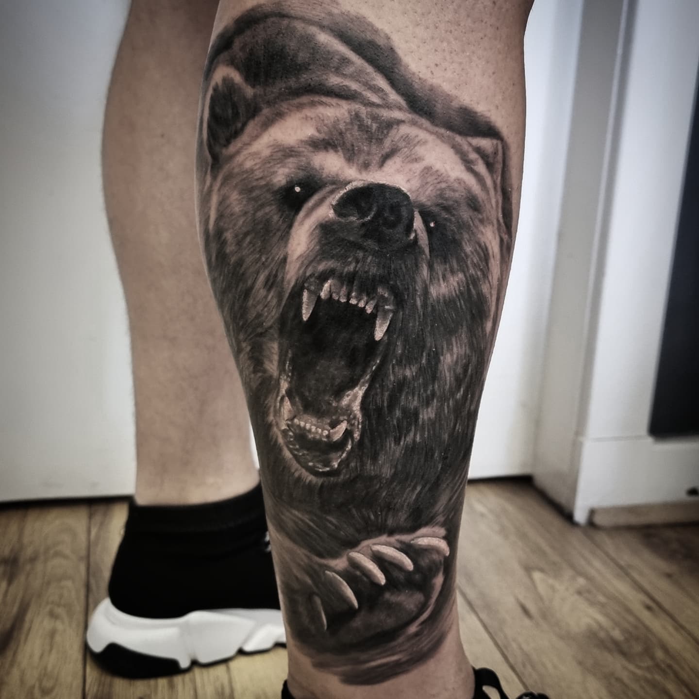 Black and grey realism animal tattoo by Tomek Turlej, tattoo artist in Edinburgh