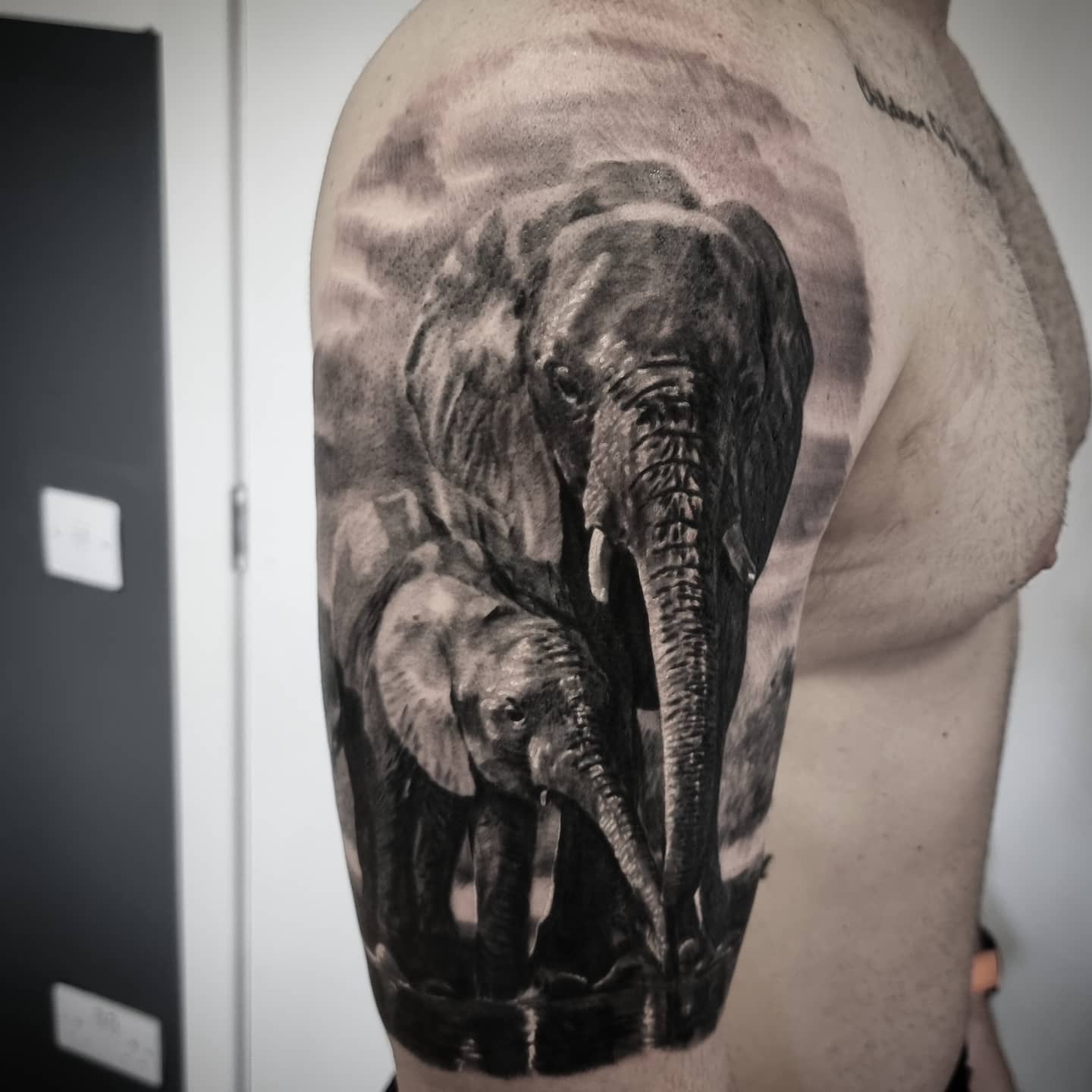 Fine detail black and grey animal tattoo, custom design by Edinburgh tattoo artist Tomek Turlej
