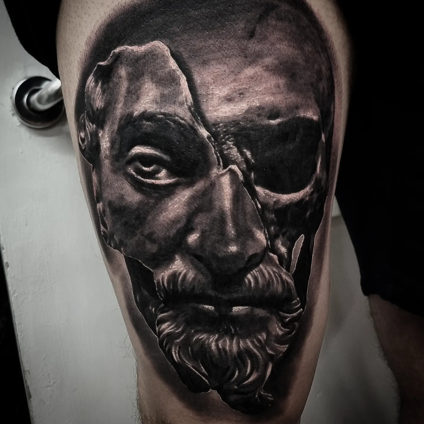 Photorealistic black and grey portrait tattoo by Tomek Turlej, Studio XIII Gallery, Scotland